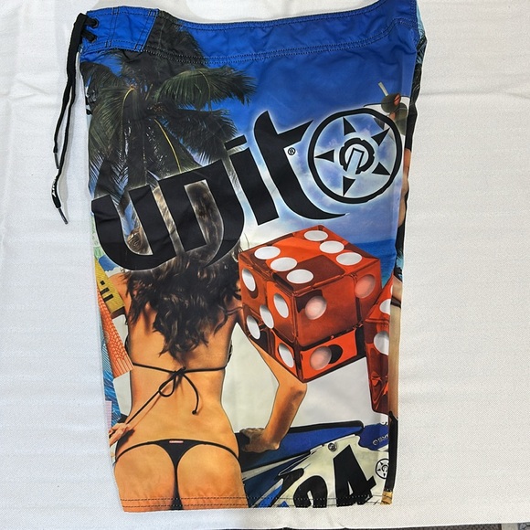 Vibrant Blue and Green Board Shorts with Tropical Design - Picture 3 of 6